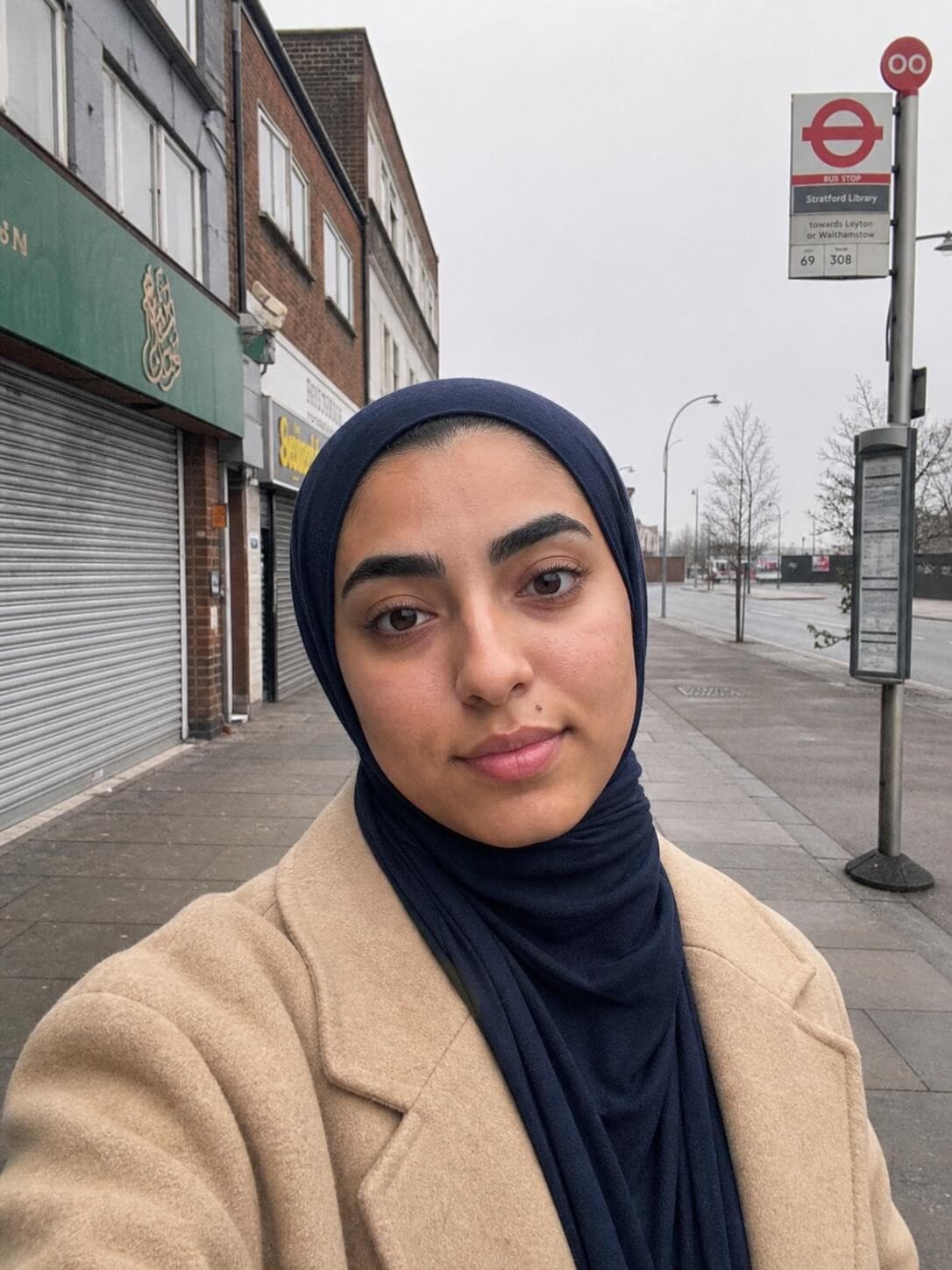 A street selfie in flat overcast light and the document photo made from it