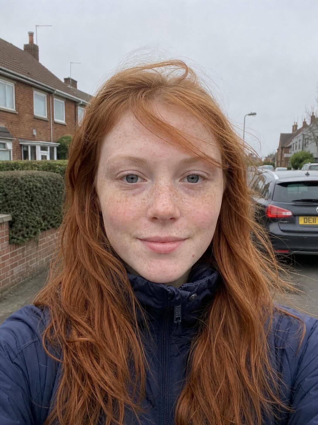 A windy pavement selfie and the document photo made from it